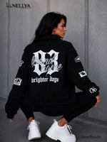 Damen Jacke Schwarz Weiß mit Oversize Streetstyle und Print Details