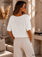 Damen Statement Bluse Weiß mit gold-beiger Applikation und V-Ausschnitt