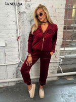 Damen Zweiteiler mit Zip-Jacke und Hose in Velours-Optik