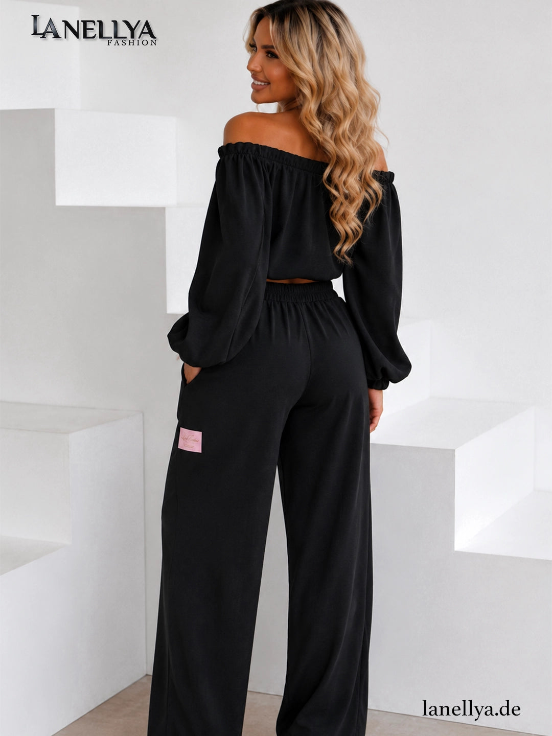 Eleganter Damen Zweiteiler Schwarz mit lockerer Hose und Off Shoulder Shirt