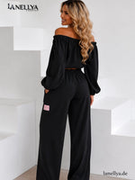 Eleganter Damen Zweiteiler Schwarz mit lockerer Hose und Off Shoulder Shirt