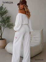 Eleganter Damen Zweiteiler Weiß mit lockerer Hose und Off Shoulder Shirt