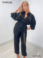 Eleganter Damen Zweiteiler schwarz mit Bindegürtel