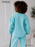 Oversize Damen Sweatshirt Mint mit Rundhalsausschnitt und Pink Details