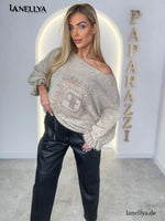 Paparazzi Damen Oversize Pullover in Beige mit One-Shoulder-Ausschnitt und Ziermotiv
