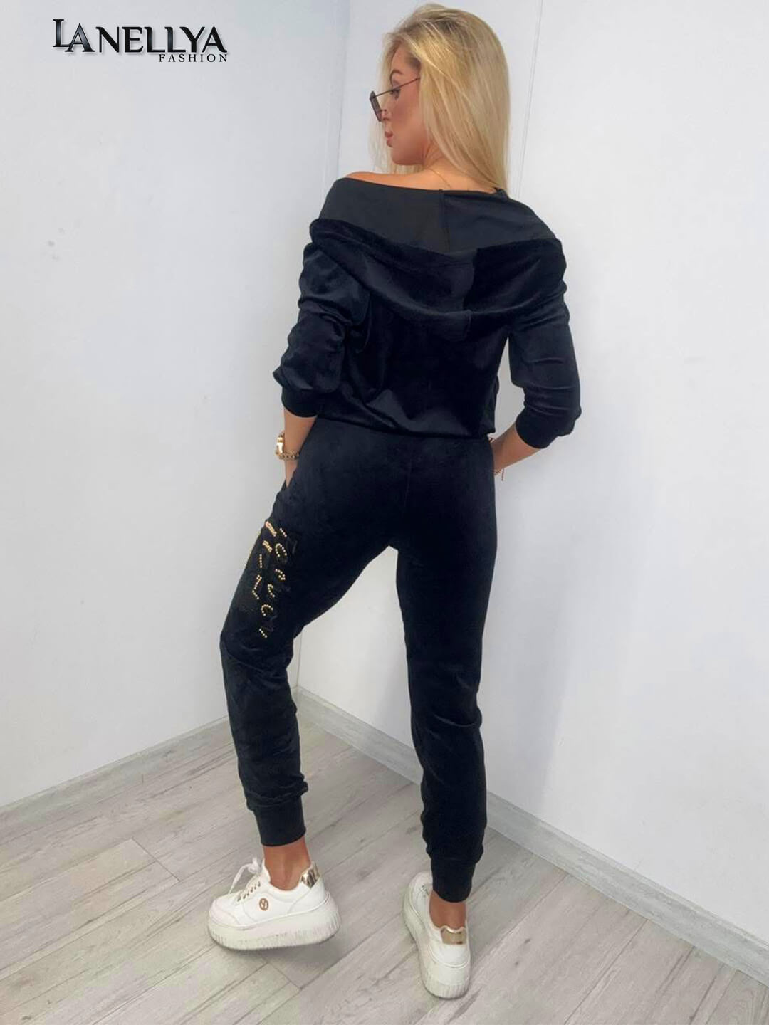 Paparazzi Damen Trainingsanzug in Schwarz mit Strass-Applikationen und Bündchen