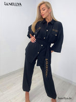 Schwarzes Damen Set mit Knopfleiste und Oversize Bluse