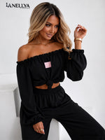 Schwarzes Damen Set mit weitem Bein und schulterfreiem Oberteil